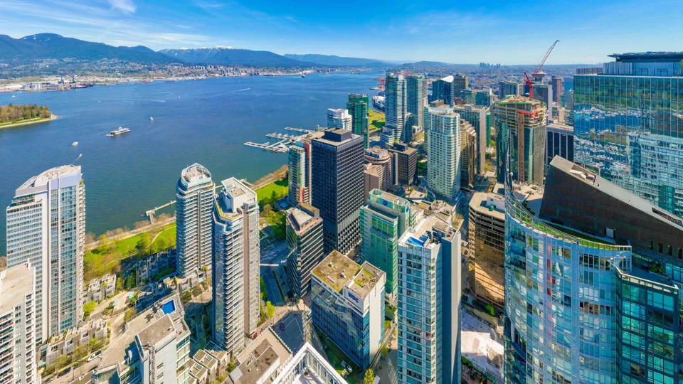 Downtown office towers beside the harbour viewed from above