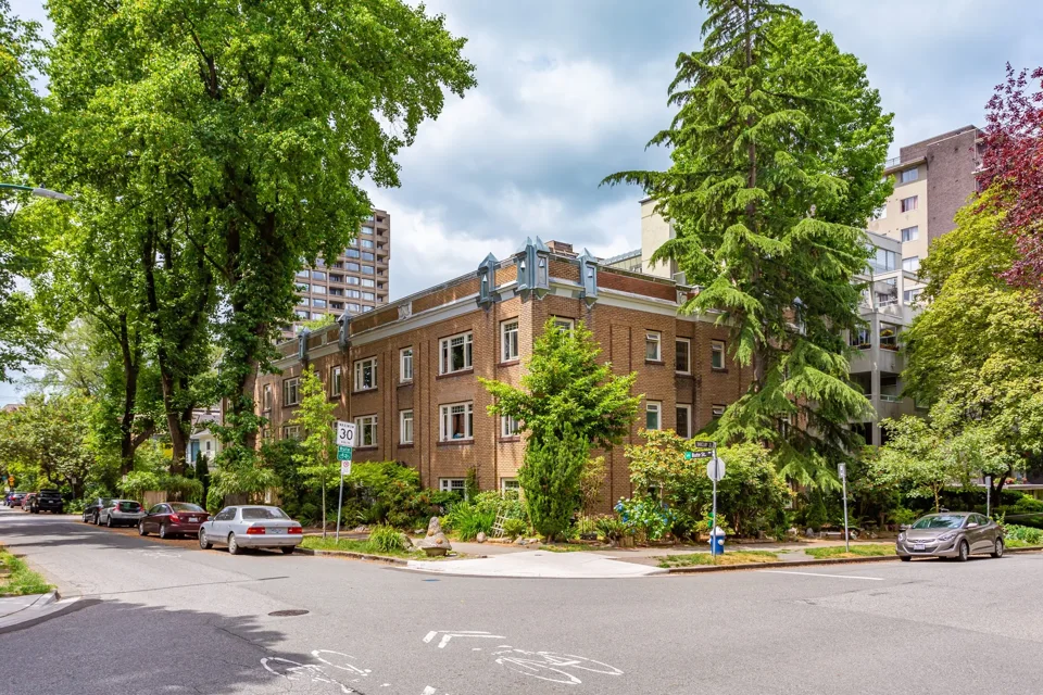 Character apartment building among trees