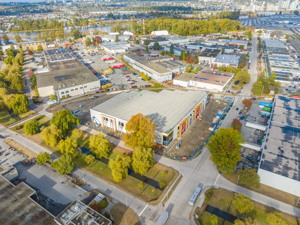 Warehouse and surrounding industrial site viewed from above